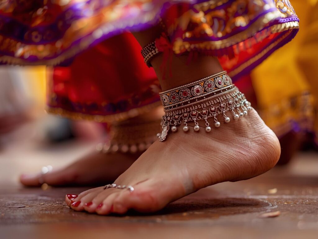 Silver anklets with tiny bells on dancing feet. 